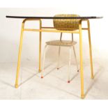 A vintage retro mid 10th Century formica topped table having a yellow and grey pattern raised on