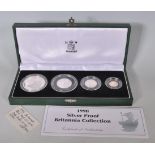 A 1998 Silver Proof Britannia Collection boxed set of four silver coins of graduating form. Within