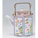 An early 20th Century Chinese teapot of hexagonal form having hand painted floral and bird panels
