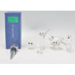 A selection of Swarovski crystal animal figurines to include a mouse, a cat, a dog, a pig, a frog