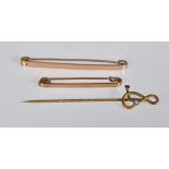 Two early 20th Century 9ct gold bar brooches of plain form, the larger hallmarked London 1922, the