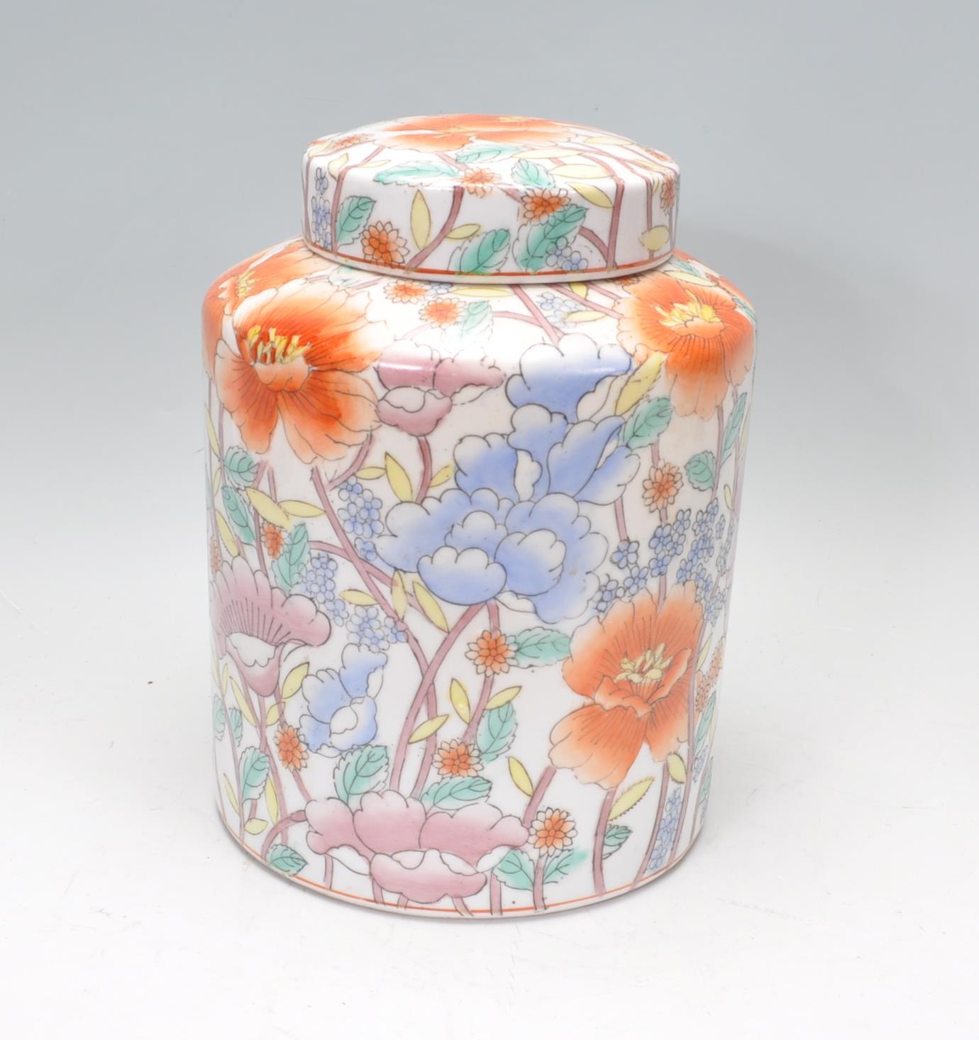 A large early 20th Century Chinese ginger jar of cylindrical form having hand painted floral sprays. - Image 2 of 6