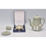A group of 20th Century Green Wedgwood jasperware ceramic items to include a teapot, ashtray,