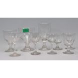 A collection of 18th and 19th century English drinking glasses to include rummers, port and sherry