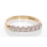 A hallmarked 9ct gold diamond 7 stone ring. Hallmarked Birmingham. Weight 2g.