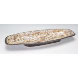 A vintage retro mid 20th Century French Keraluc Quimper side dish of rounded rectangular form with