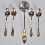 A selection of stamped 830 Norwegian silver tea spoons having twist design handles with engraved
