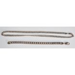 A stamped 925 silver flat link necklace chain having a lobster clasp. Together with similar silver