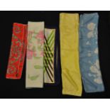 A group of five vintage designer Jacqmar silk scarves to include a wide selection of prints and
