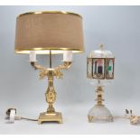 Two antique style table lamps to include a brass table lamp with three scrolled branch arms with