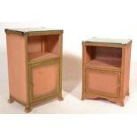 A matched pair of mid century, circa 1950's rattan weave pink Lloyd Loom style linen baskets of