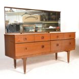 A good vintage retro 20th Century teak wood dressing table raised on straight tapering supports with