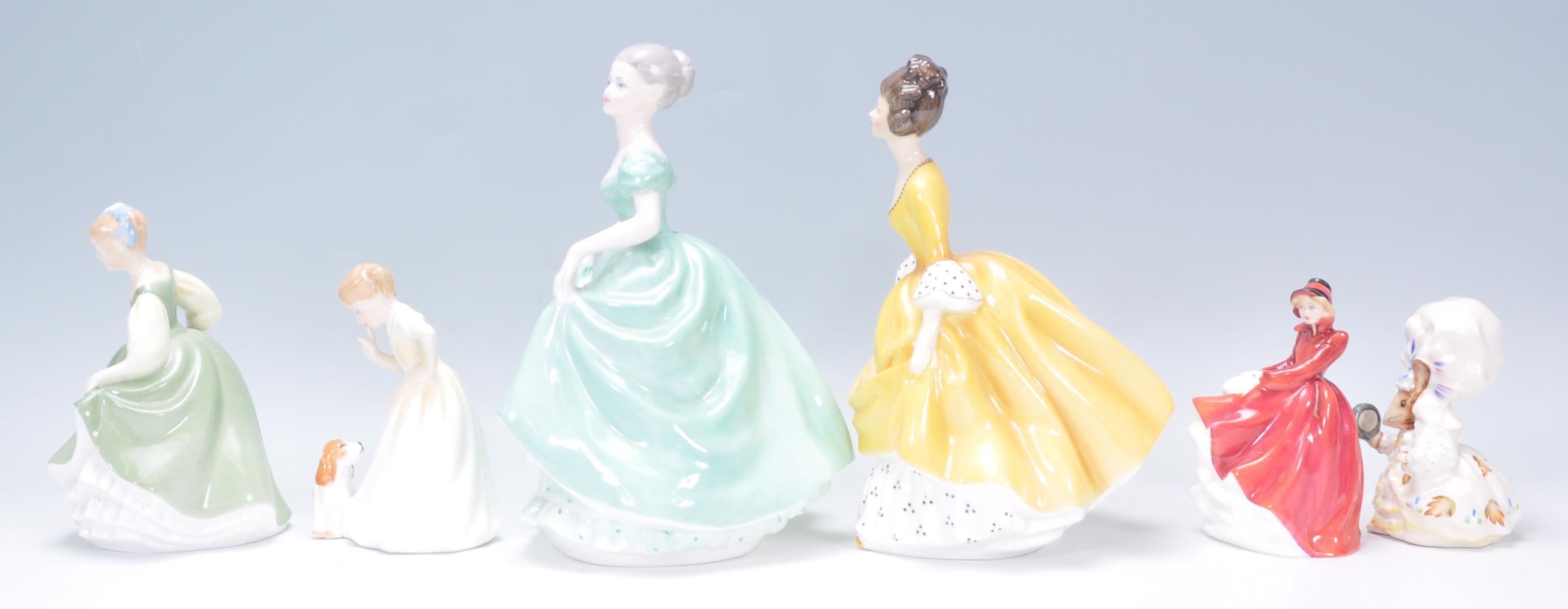 A mixed collection of ceramic figurines to include three Royal Doulton ladies one Emma HN 3208, - Image 4 of 8