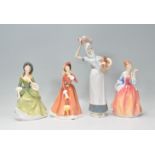 A group of three Royal Doulton ladies to include Julia HN 2705, Fleur HN 2369 and Sandra HN 2401.