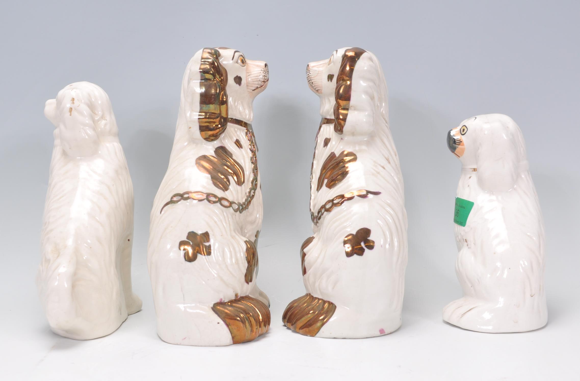 A group of four 19th Century Victorian fire side staffordshire dogs to include two large and two - Image 2 of 7