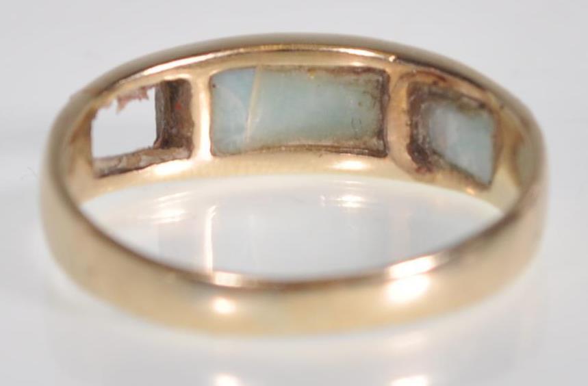 A stamped 14ct gold ring set with blue stone panels to the head. Weight 2.2g. Size N. Please note - Image 4 of 6