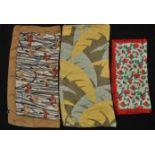 A group of four vintage Liberty printed silk scarves to include an Iris print scarf, a tulip print