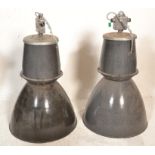 A set of 2 mid century Industrial black enamelled painted cylindrical factory pendant shades of