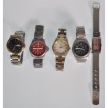 A group of five gents / ladies wristwatches to include a designer DKNY ladies watch having a pink