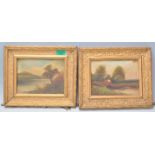 A pair of early 20th Century oil on board landscape paintings set within gilt moulded gesso frames