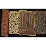 A group of three vintage Liberty printed silk scarves all of floral design, one of red roses on a