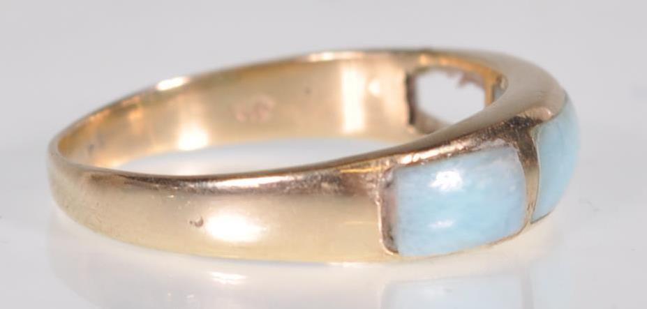 A stamped 14ct gold ring set with blue stone panels to the head. Weight 2.2g. Size N. Please note - Image 3 of 6