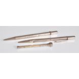 A group of three silver hallmarked propelling pencils to include two long examples one with engine