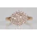 An English hallmarked 9ct yellow gold cluster ring set with diamonds of approx 0.25pts. Hallmarked