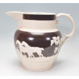A large 19h century cameo ware brown and pearlware jug of bulbous form with large c-scroll handle,