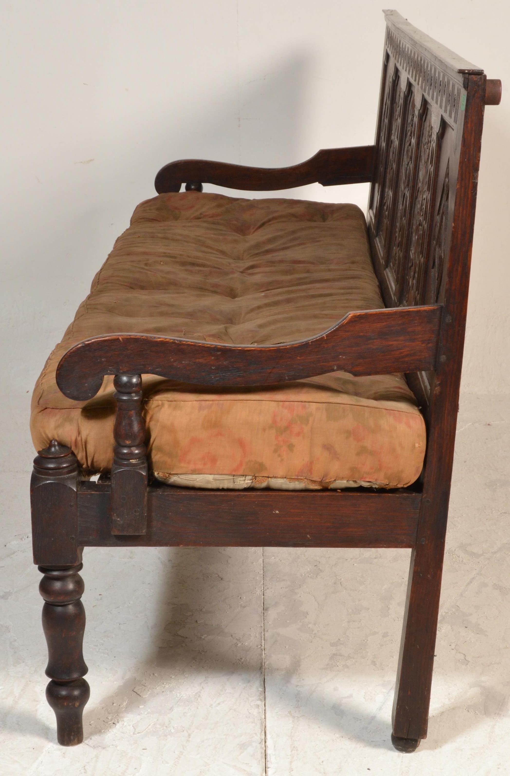 An 18th century large carved West country oak hall settle bench. Raised on turned legs with - Image 6 of 6