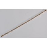 An English hallmarked 14ct yellow gold ladies bracelet having thick crossover links set with