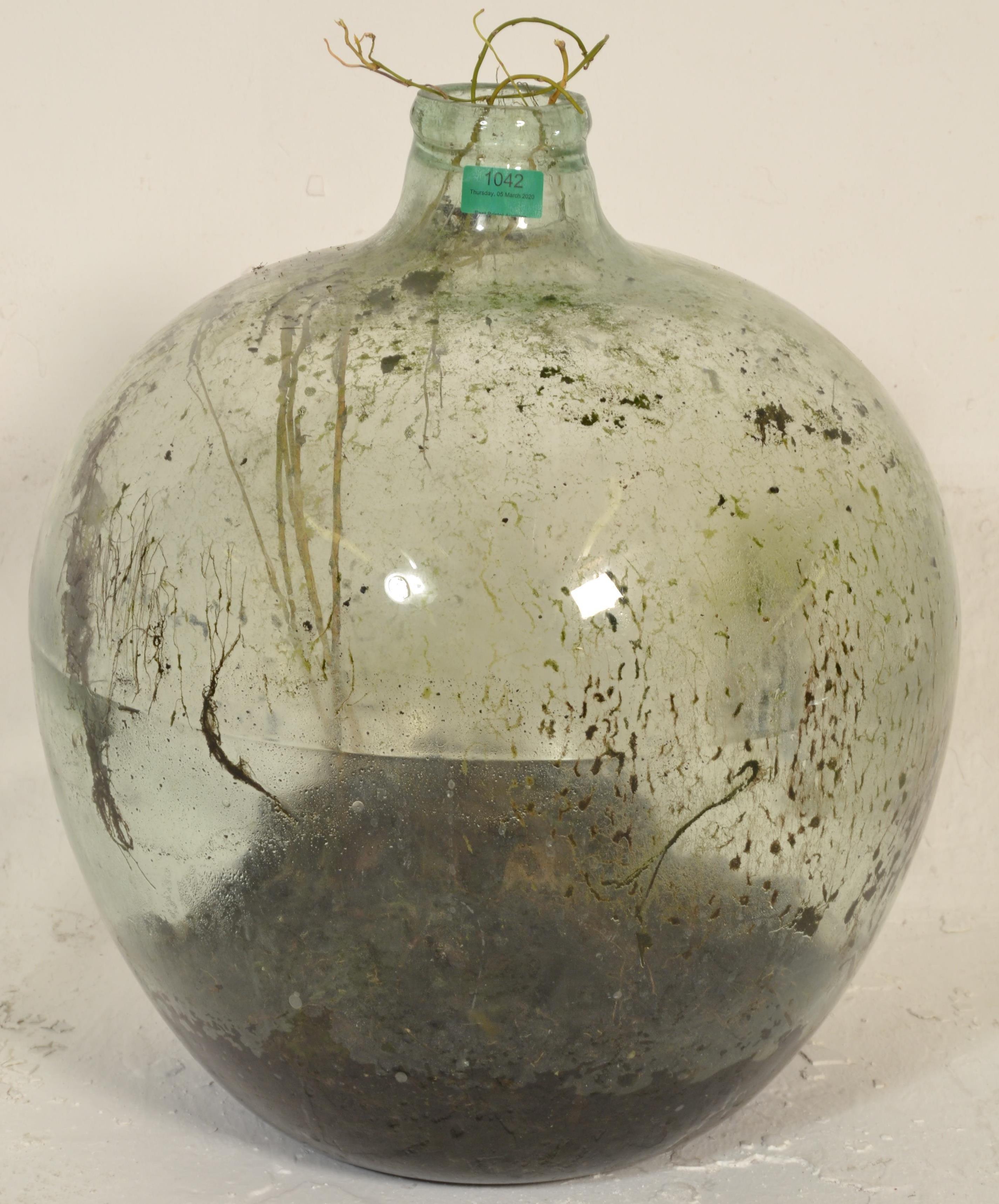 A vintage early 20th century large green glass acid carboy bottle  of globe form with waisted neck - Image 2 of 7