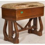 An Edwardian mahogany and ebony line inlaid Queen Anne revival dressing table stool being raised