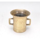 A Chinese bronze censer ding bowl of cylindrical form having a flared rim and twin handles. Engraved