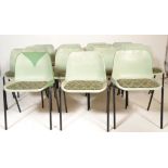 A group of 15 vintage retro 20th Century Restall Production stacking chairs raised on black metal