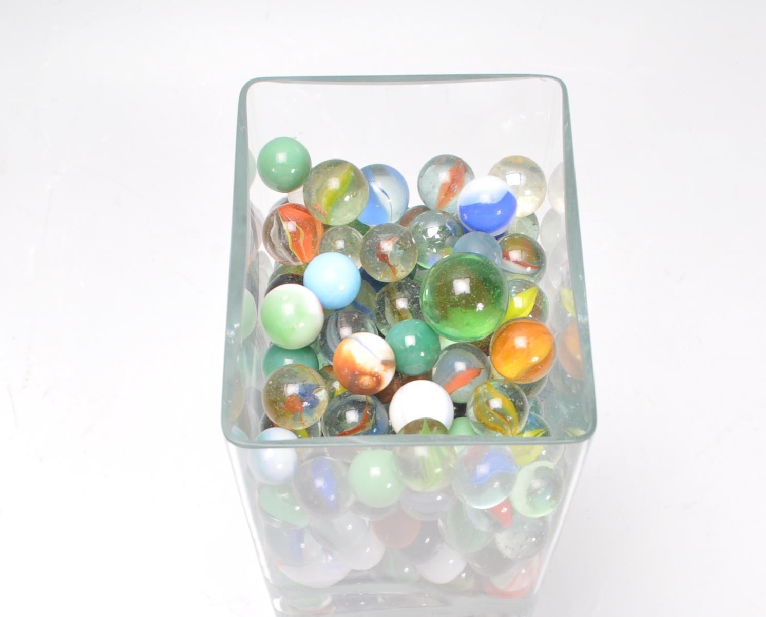 A collection of marbles to include glass cats eye marbles, some white and coloured glass examples, - Image 11 of 11