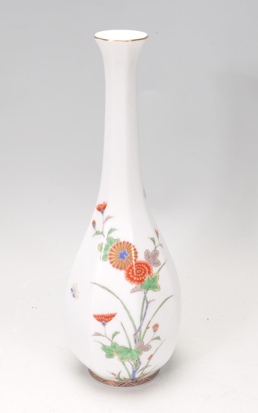 A decorative early 20th century Fukagawa vase of faceted baluster form having hand painted