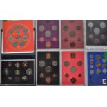 A selection of annual uncirculated British coin collections to include 2004, 1990, 1971, 1973, 1978,
