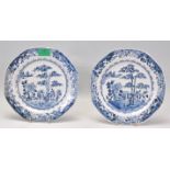 Two 19th Century Chinese blue and white plates of octagonal form decorated with bamboo and stones in