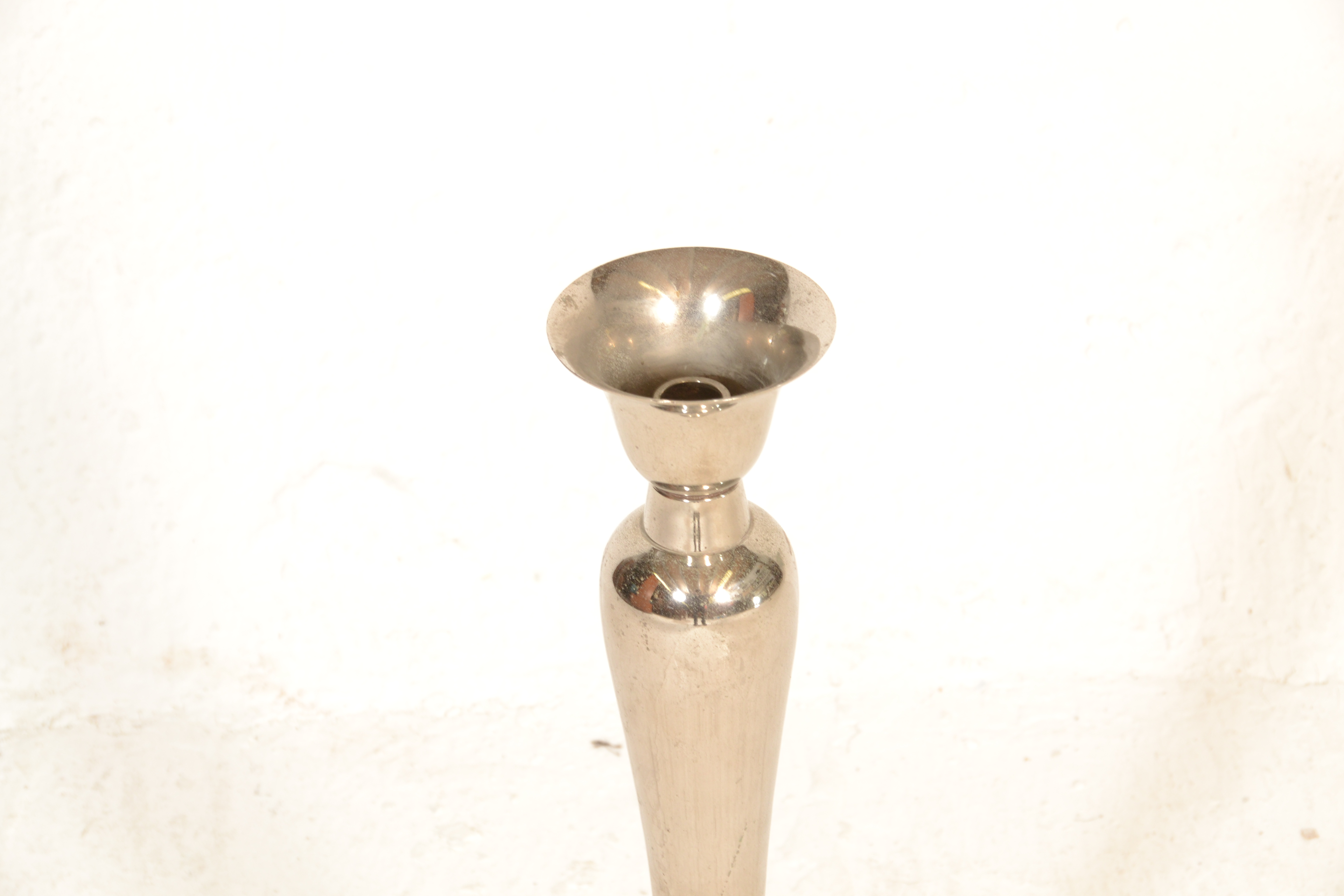 A pair of 20th Century silver tone candlesticks having rounded tapering stems with circular bases - Image 4 of 4
