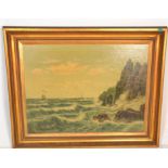 A large 19th century oil on canvas maritime coastal scene painting of crashing waves to rocky