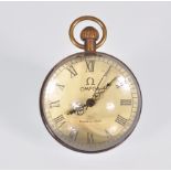A vintage Omega style desktop glass orb clock having a white enamelled face with roman numerals to