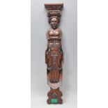 A 20th Century carved oak antique style figural wall bracket having a carved face to the top, with