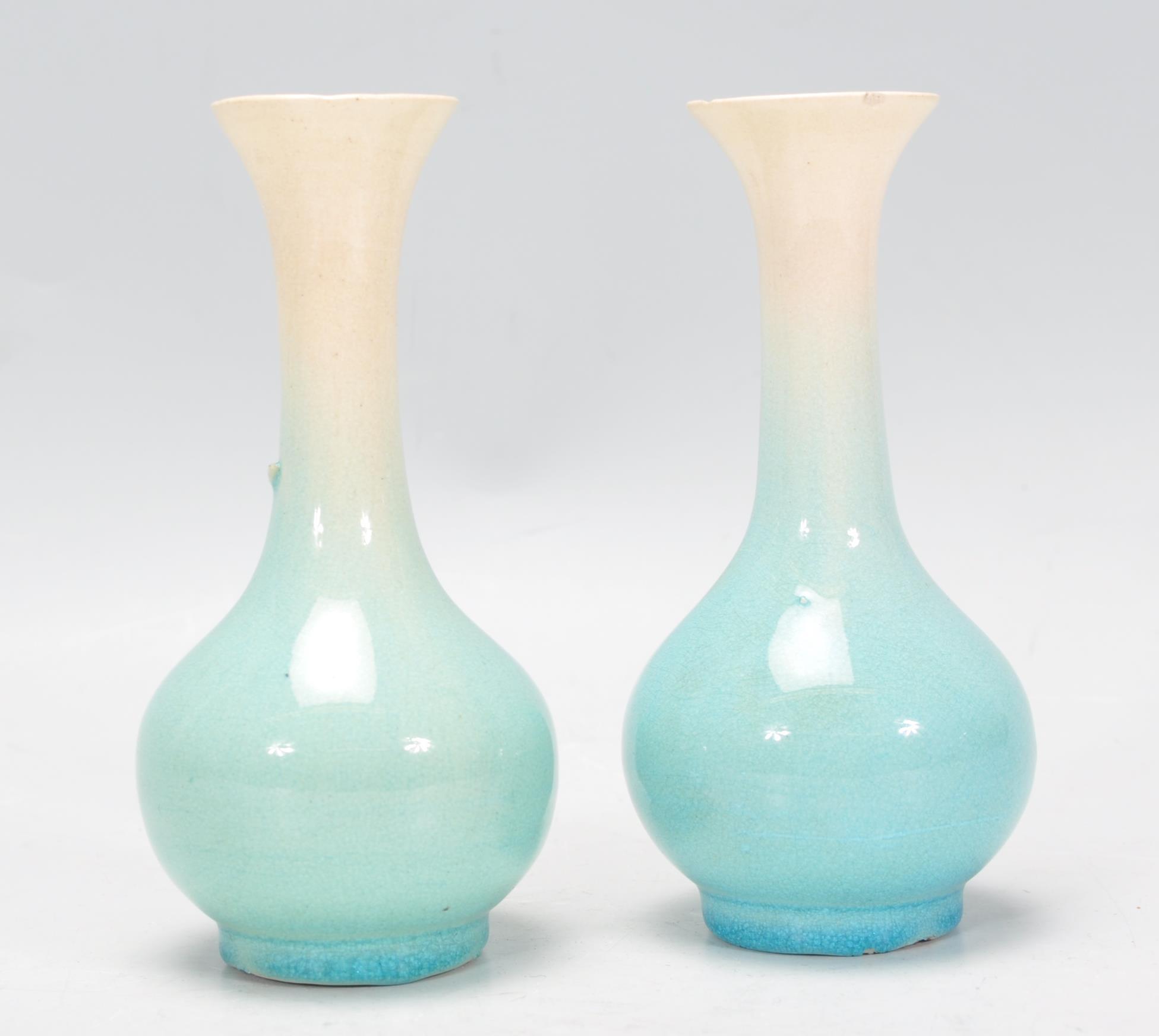 A pair of Japanese porcelain bottle vases vases with tapering cylindrical necks with flared necks - Image 3 of 6
