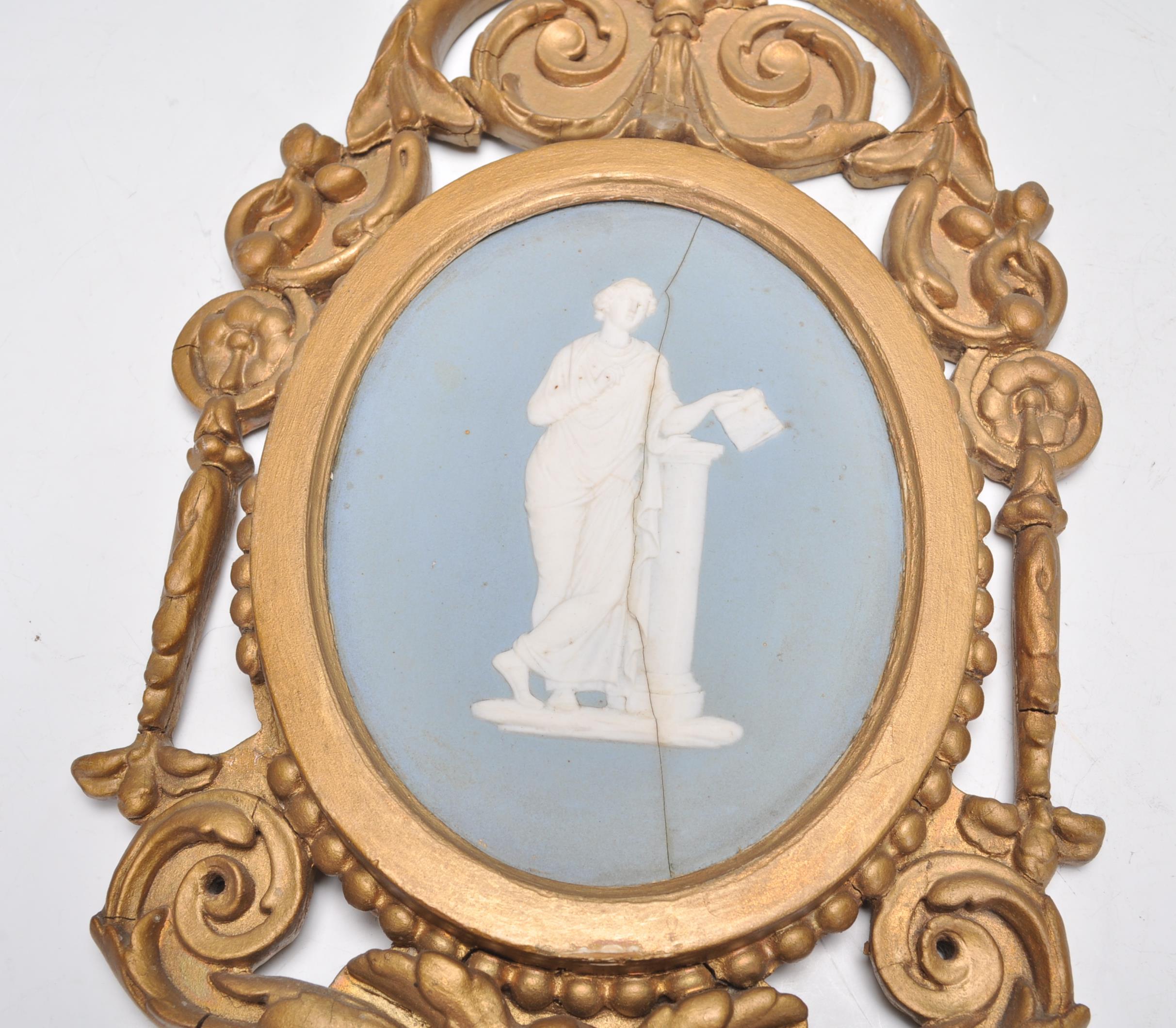 A pair of 19th century Wedgwood cameo plaques inset with classical scholars to each on oval blue - Image 5 of 7