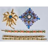 A selection of vintage Joan Rivers fashion jewellery to include a large statement brooch set with
