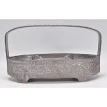 A 20th Century pewter horderves sectional dish of oval form having four fitted glass dished to the