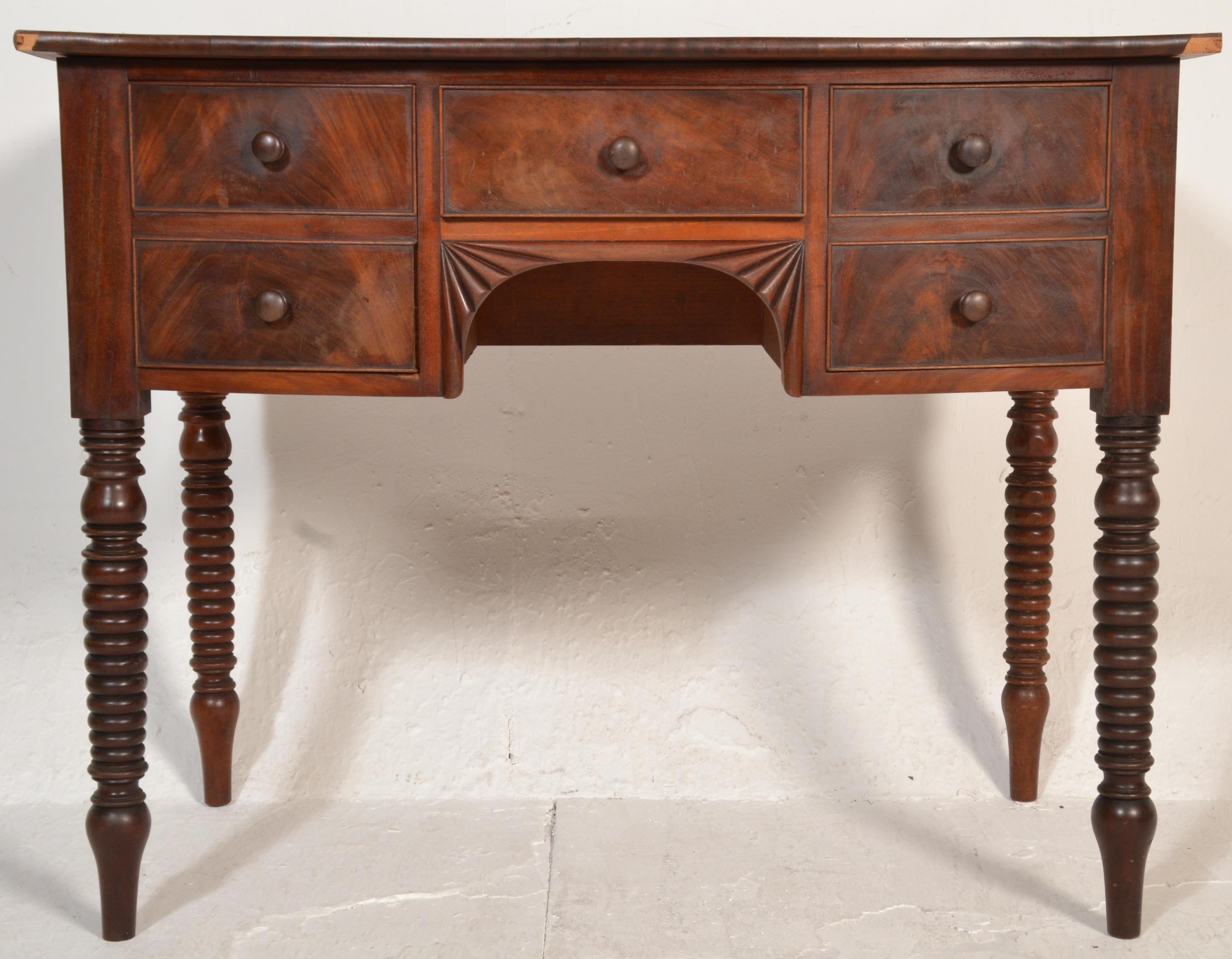 A 19th century George III mahogany bow fronted writing table desk. Raised on bobbin supports - Image 3 of 7