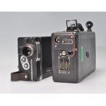 A vintage cine Kodak Model B camera together with a Dotmar wind up film camera. Both leather cased.