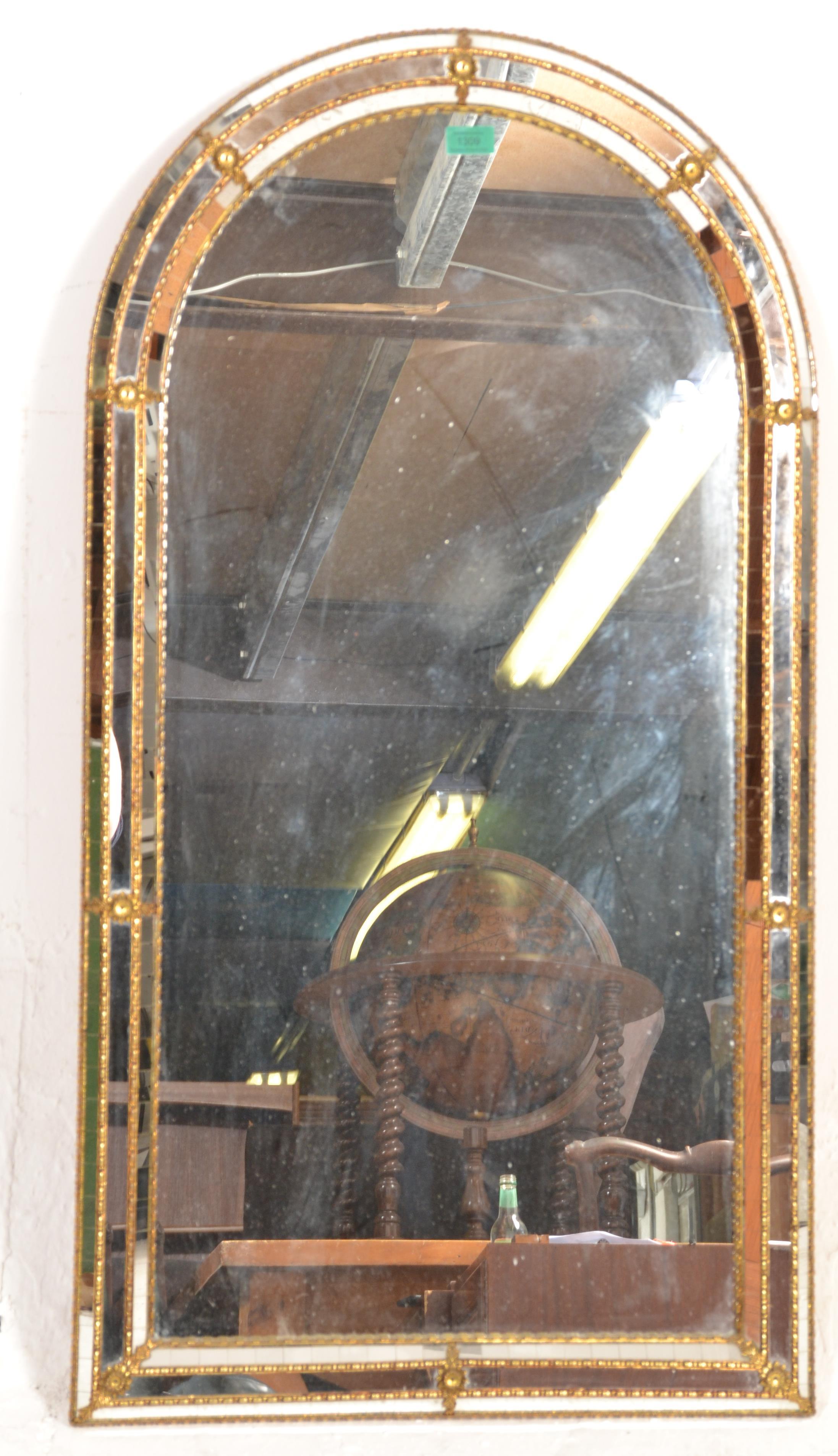 A 20th century Venetian gilt mirror of arched form with cushion border adorned qwith multiple mirror - Image 6 of 7